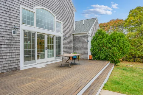 a view of a swimming pool with a lounge chair