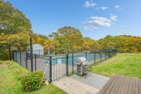 a view of backyard with green space