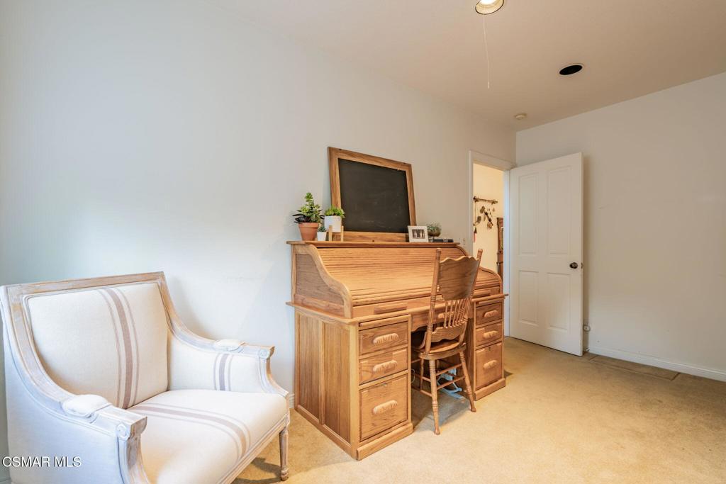 6078 Peppertree Lane Simi Valley, CA 93063 - Photo 23 of 59 a room with a couch and a table in it