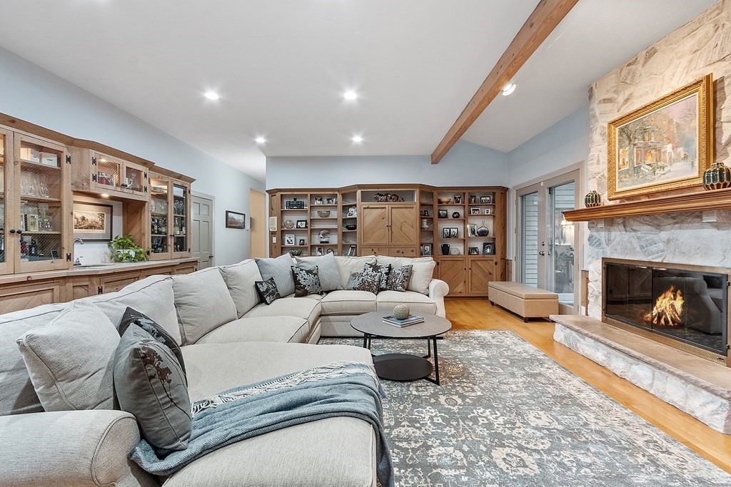 110 Mattison Drive Concord, MA 01742 - Photo 11 of 41 a living room with furniture fireplace and a large window