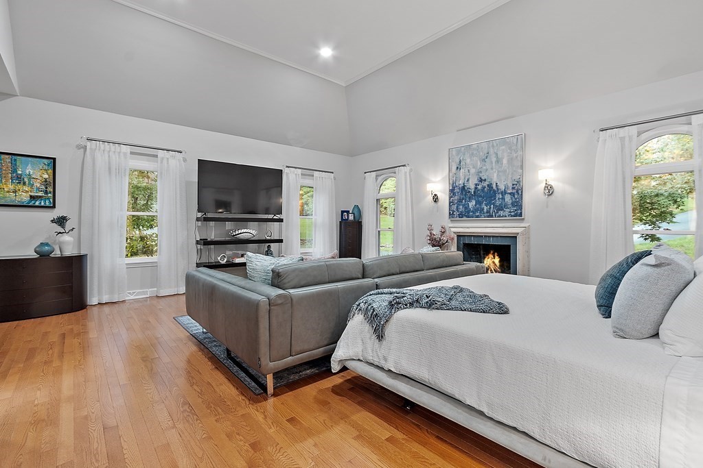 110 Mattison Drive Concord, MA 01742 - Photo 14 of 41 a bed room with a bed and a television