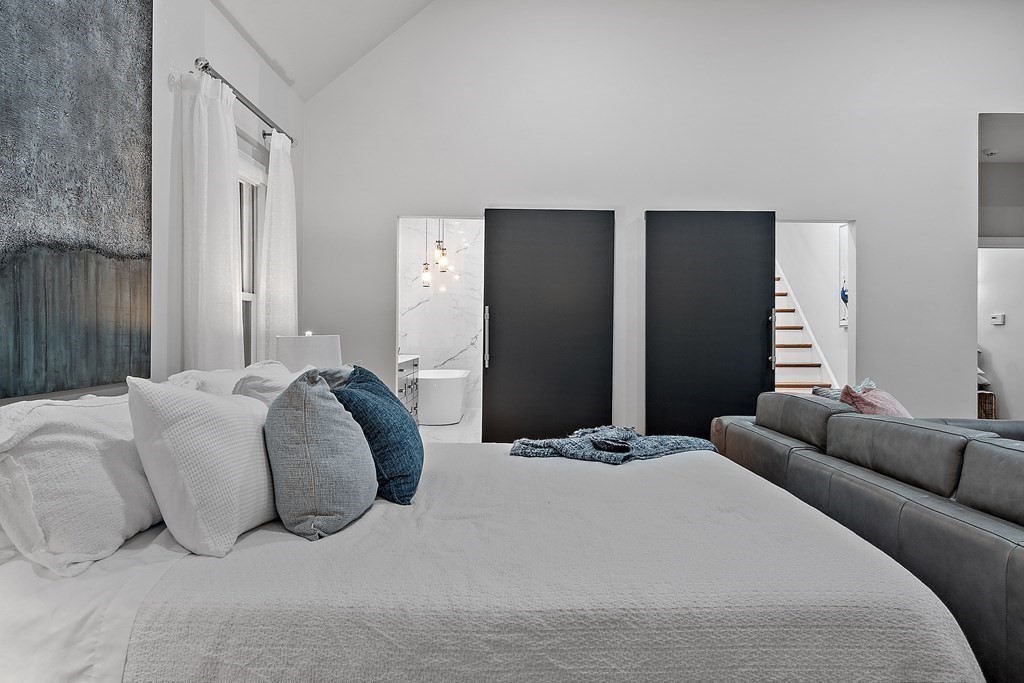 110 Mattison Drive Concord, MA 01742 - Photo 16 of 41 a bedroom with a bed and a couch