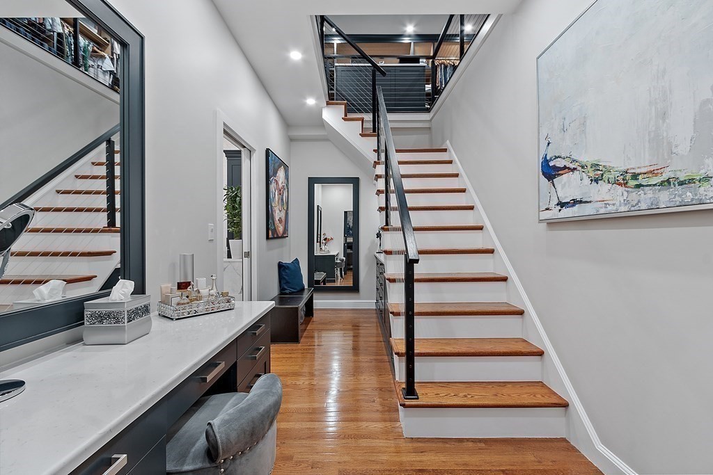 110 Mattison Drive Concord, MA 01742 - Photo 17 of 41 a view of entryway and hall with wooden floor