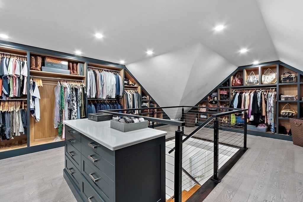 110 Mattison Drive Concord, MA 01742 - Photo 18 of 41 a view of an entryway wooden floor and a living room