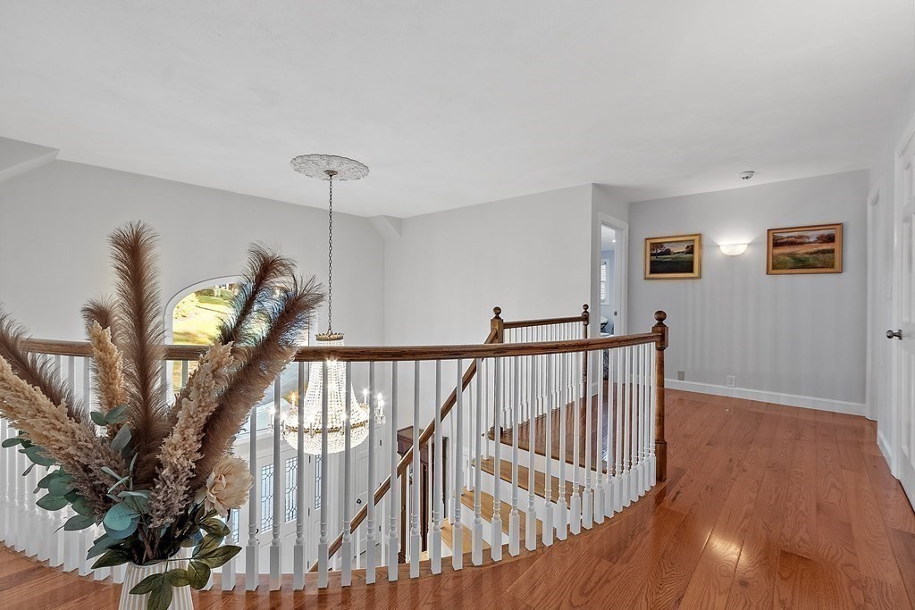 110 Mattison Drive Concord, MA 01742 - Photo 20 of 41 a view of staircase with railing and white walls