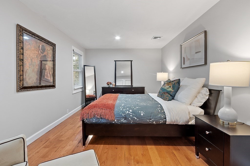110 Mattison Drive Concord, MA 01742 - Photo 26 of 41 a bed room with a bed and a night stand