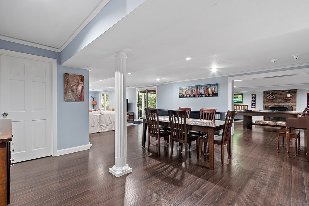 110 Mattison Drive Concord, MA 01742 - Photo 30 of 41 a view of a dining room with furniture and wooden floor