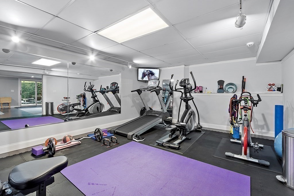 110 Mattison Drive Concord, MA 01742 - Photo 32 of 41 a view of a room with gym equipment