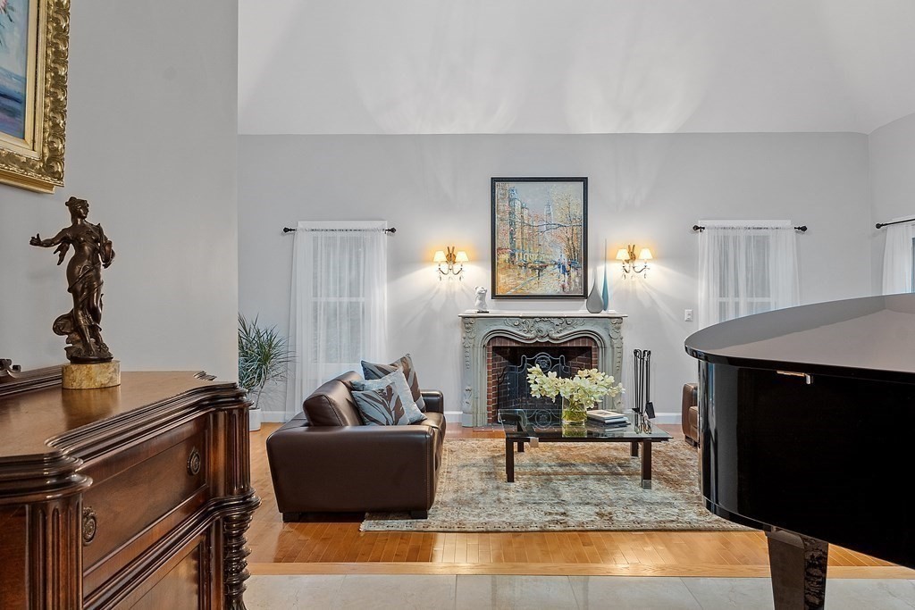110 Mattison Drive Concord, MA 01742 - Photo 5 of 41 a living room with furniture and a fireplace