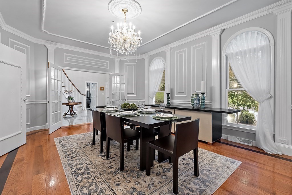 110 Mattison Drive Concord, MA 01742 - Photo 7 of 41 a view of a dining room with furniture window and wooden floor