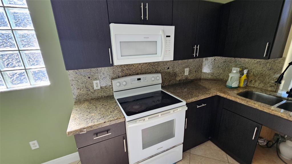 6960 Southwest 39th Street, Unit E101 Davie, FL 33314 - Photo 3 of 15