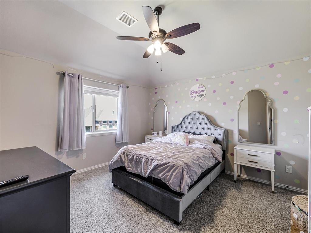 1216 Tree Shadow Lane Anna, TX 75409 - Photo 28 of 37 a bedroom with a bed and window