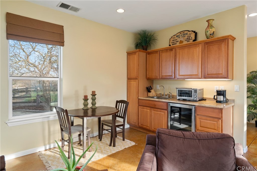 3131 Cielo Grande Atascadero, CA 93422 - Photo 30 of 42 game room wet bar with mini frig