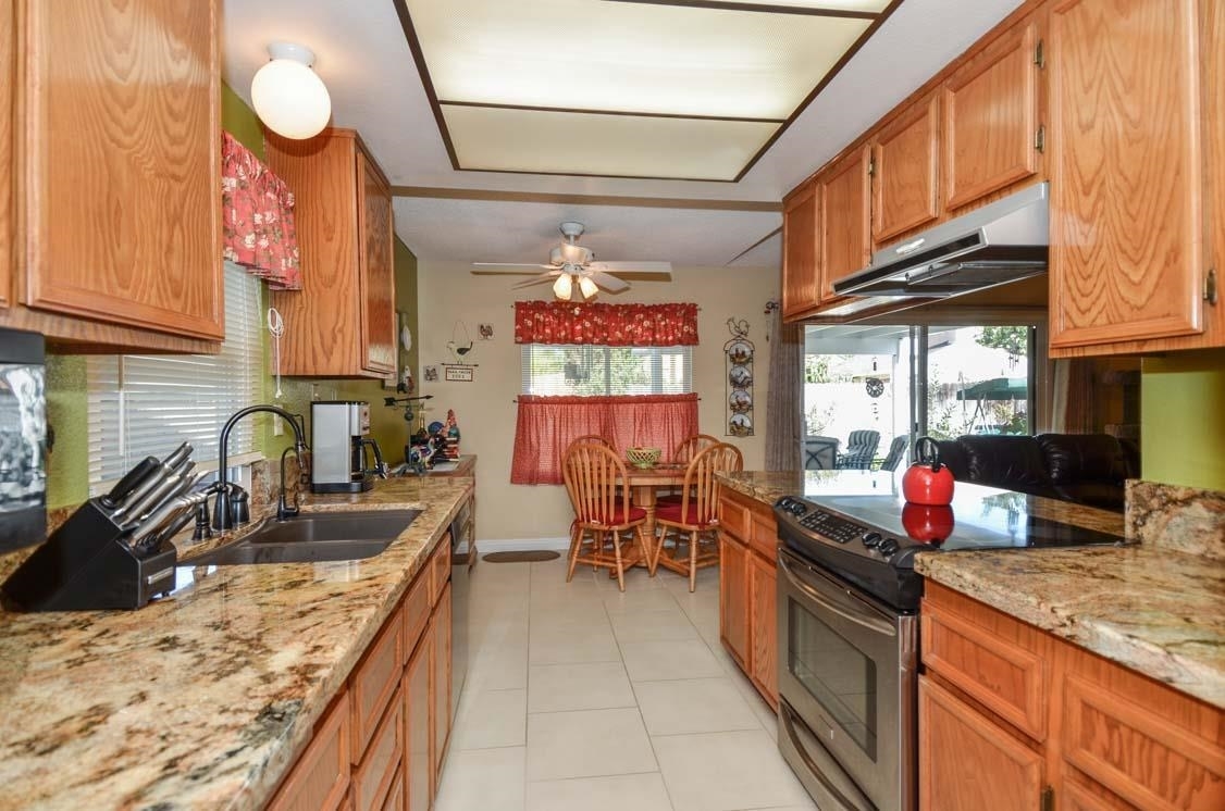3521 Chauncey Road Oceanside, CA 92056 - Photo 7 of 24 Looking into Kitchen from Dining Area