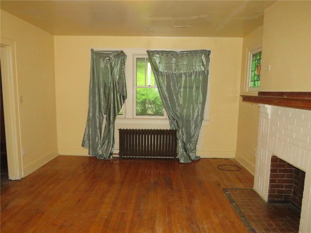 423 Braddock Road Pittsburgh, PA 15221 - Photo 4 of 36 a view of entryway with wooden floor