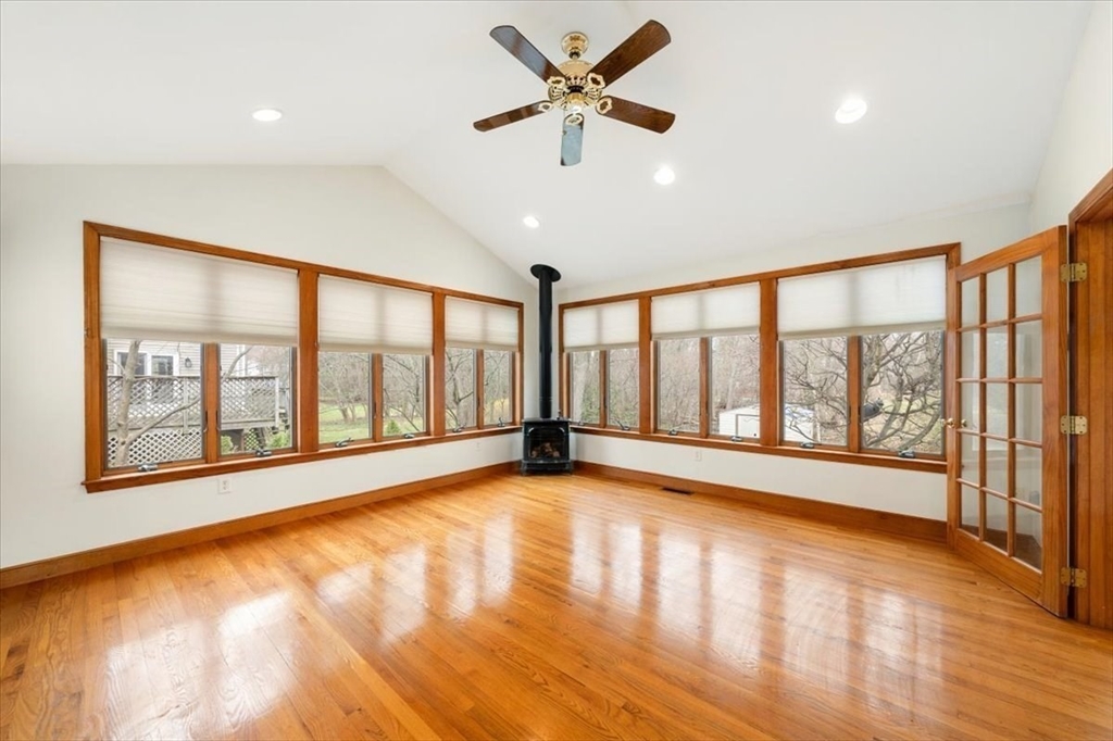 28 Barnesdale Road Natick, MA 01760 - Photo 14 of 33 a view of an empty room with a window and wooden floor