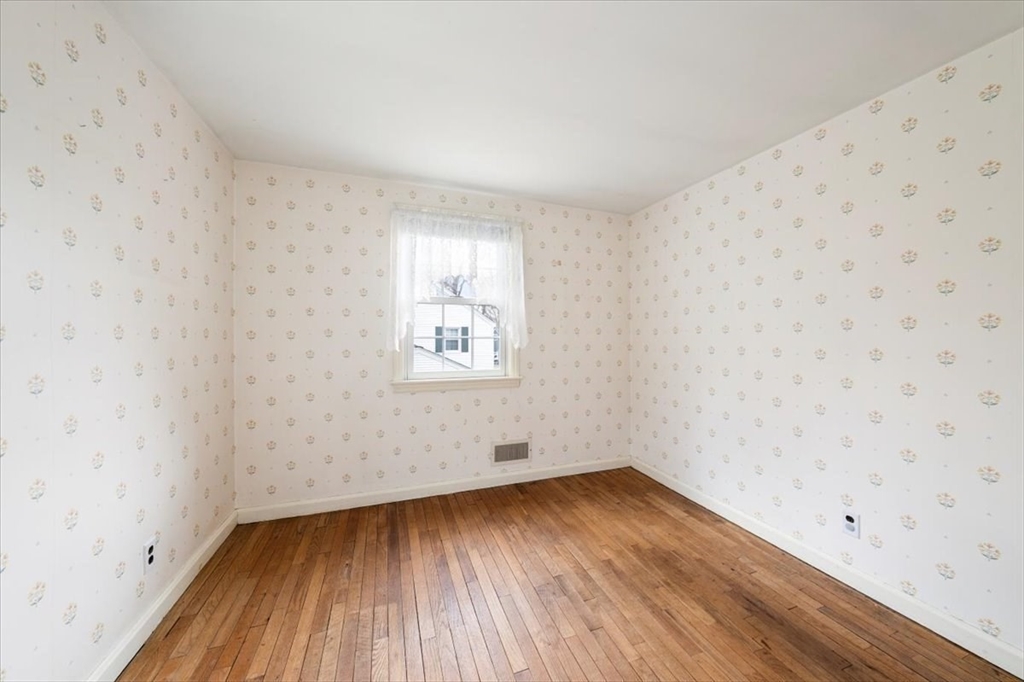 28 Barnesdale Road Natick, MA 01760 - Photo 20 of 33 a view of a room with wooden floor and white walls
