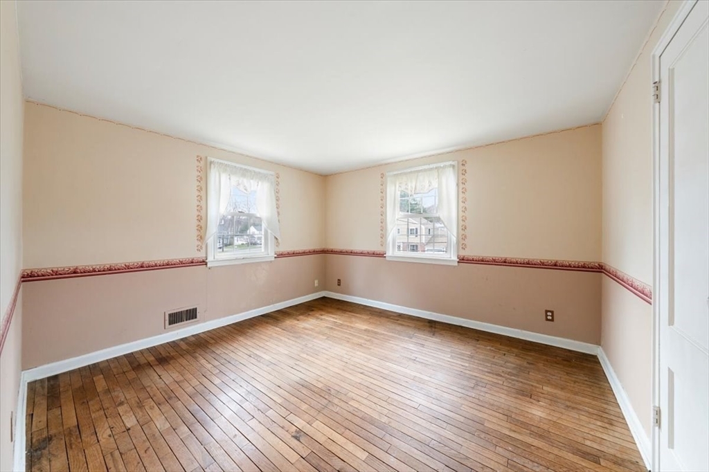 28 Barnesdale Road Natick, MA 01760 - Photo 21 of 33 a view of empty room with wooden floor and fan
