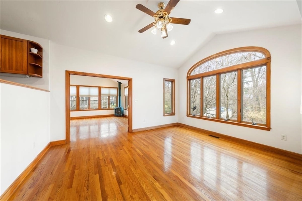 28 Barnesdale Road Natick, MA 01760 - Photo 4 of 33 a view of an empty room with wooden floor and a window