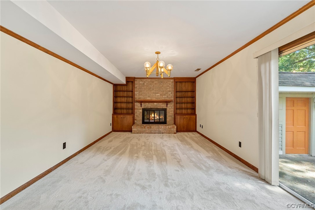 401 Nottingham Drive Colonial Heights, VA 23834 - Photo 26 of 44 a view of an empty room with a fireplace and a window
