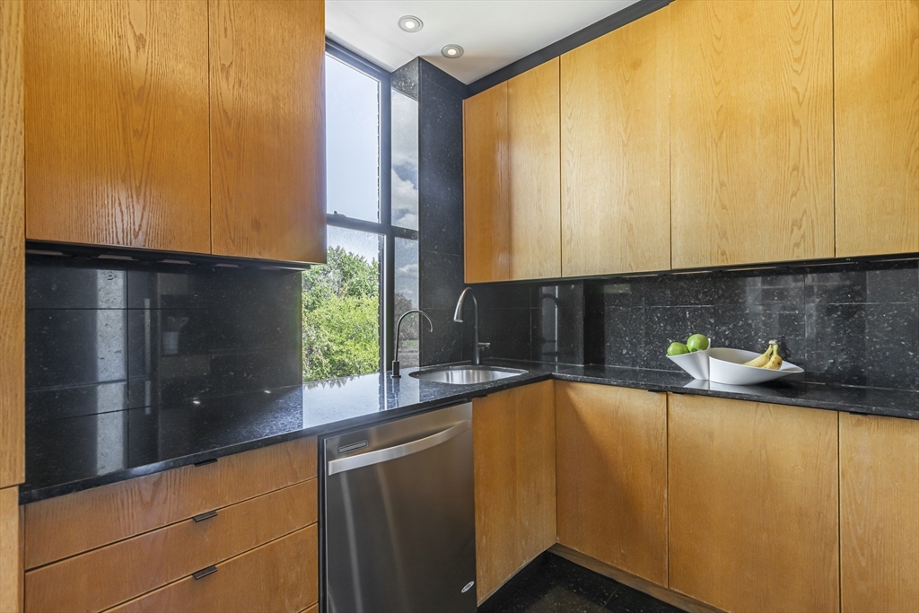 33 Bay State Road, Unit 3 Boston, MA 02215 - Photo 6 of 25 a kitchen with a sink and a window