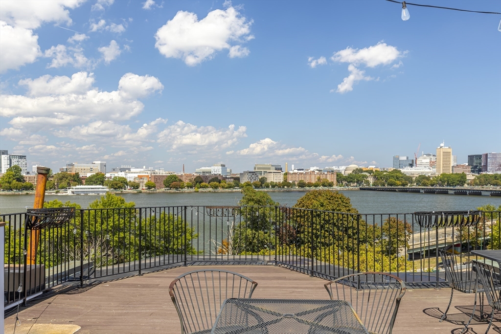 33 Bay State Road, Unit 3 Boston, MA 02215 - Photo 8 of 25 a view of a balcony with two chairs