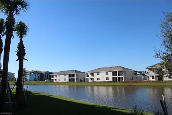 a view of a lake with houses