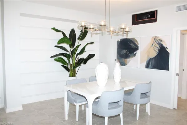 a view of kitchen with dining area
