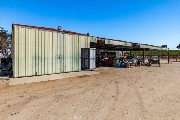 a view of a backyard of the house