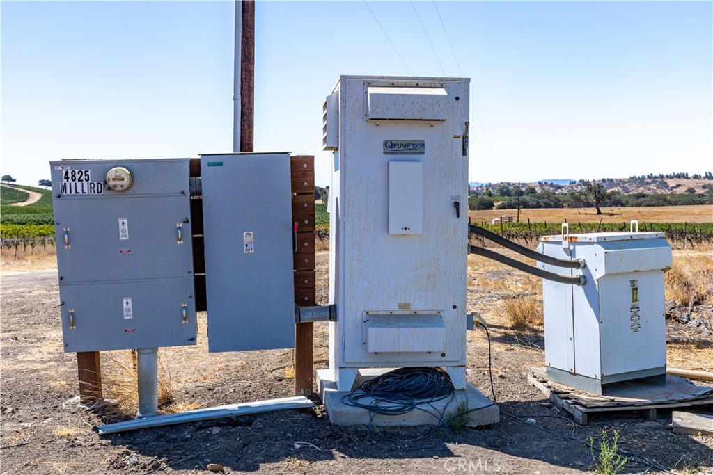 4825 Mill Road Paso Robles, CA 93446 - Photo 30 of 35 a view of a house with a floor to ceiling window and wooden floor
