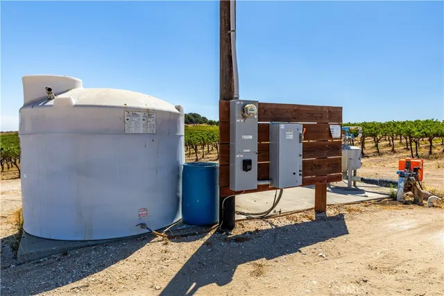 a view of a tree in front of a yard