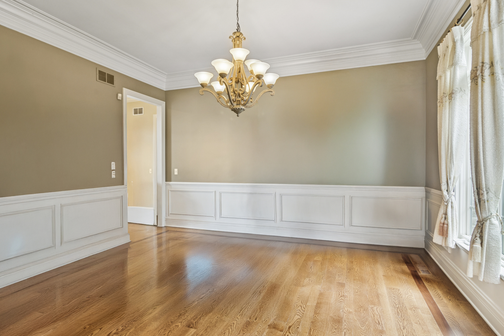 22292 North Prairie Lane Kildeer, IL 60047 - Photo 11 of 85 a view of an empty room with window and wooden floor