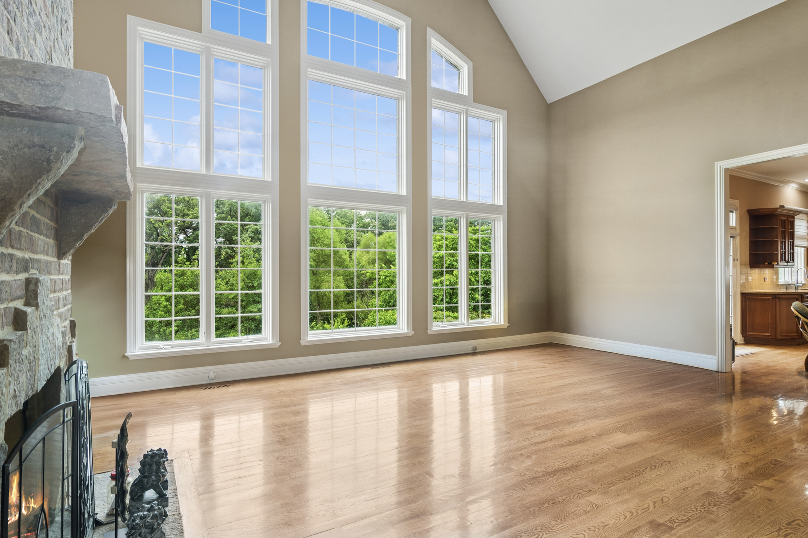 22292 North Prairie Lane Kildeer, IL 60047 - Photo 24 of 85 a view of an empty room with a window and wooden floor