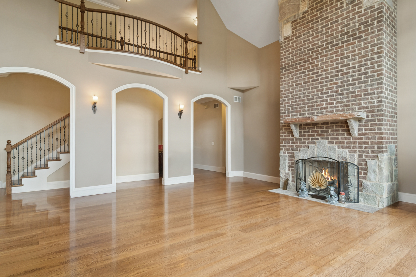 22292 North Prairie Lane Kildeer, IL 60047 - Photo 28 of 85 a view of livingroom with fireplace wooden floor and staircase