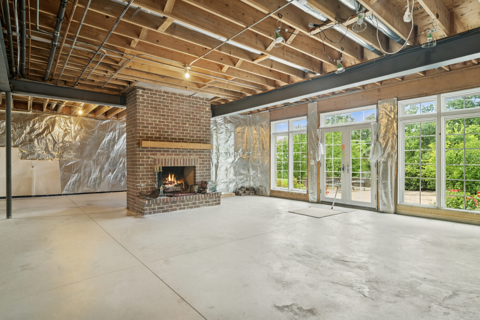 22292 North Prairie Lane Kildeer, IL 60047 - Photo 62 of 85 a view of an empty room with a fireplace