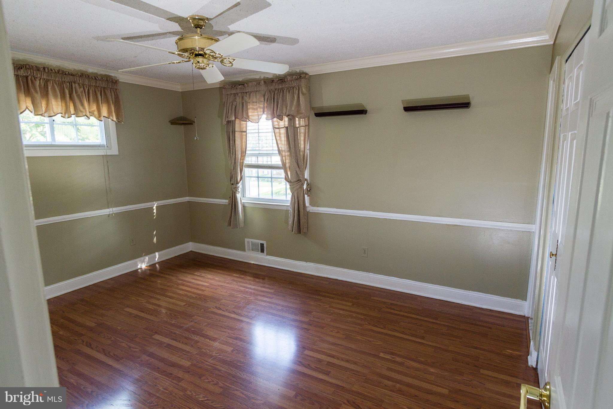 2110 Cider Mill Road Baltimore, MD 21234 - Photo 17 of 30 Bedroom - Crown molding and chair rail