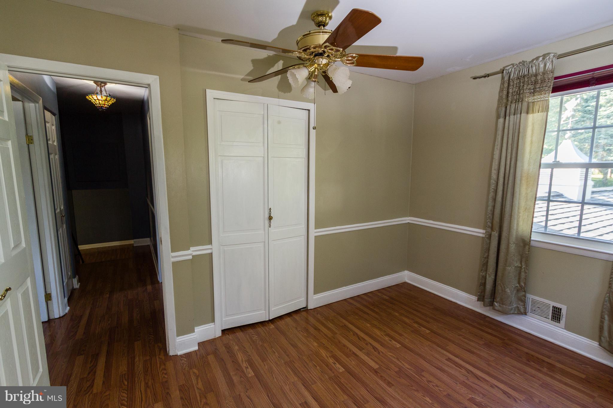 2110 Cider Mill Road Baltimore, MD 21234 - Photo 20 of 30 Bedroom - Chair rail and Pergo floor