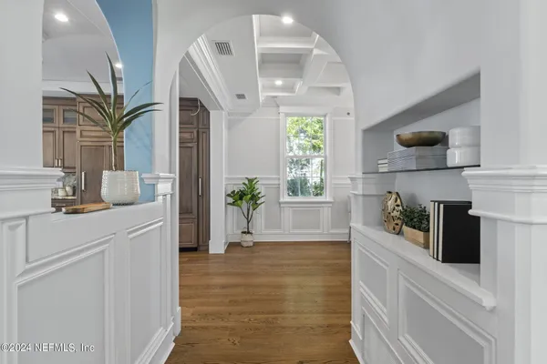 a kitchen with granite countertop a sink and a window