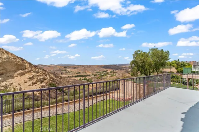a view of a balcony with city view