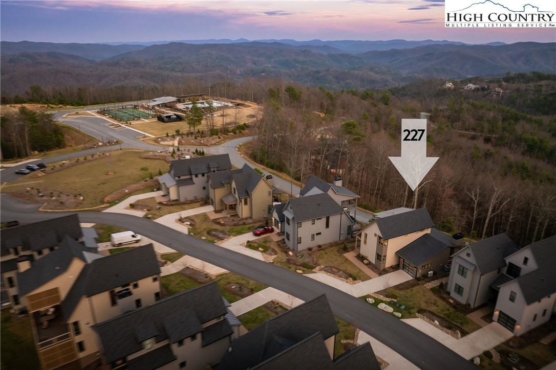 227 Calico Court Boone, NC 28607 - Photo 33 of 47 an aerial view of residential houses with outdoor space