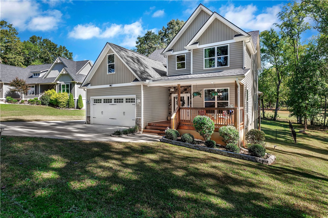 3004 Cobbs Way Anderson, SC 29621 - Photo 36 of 46 Gable rooflines and vertical siding accents highlight the architectural design of this multi-level home.