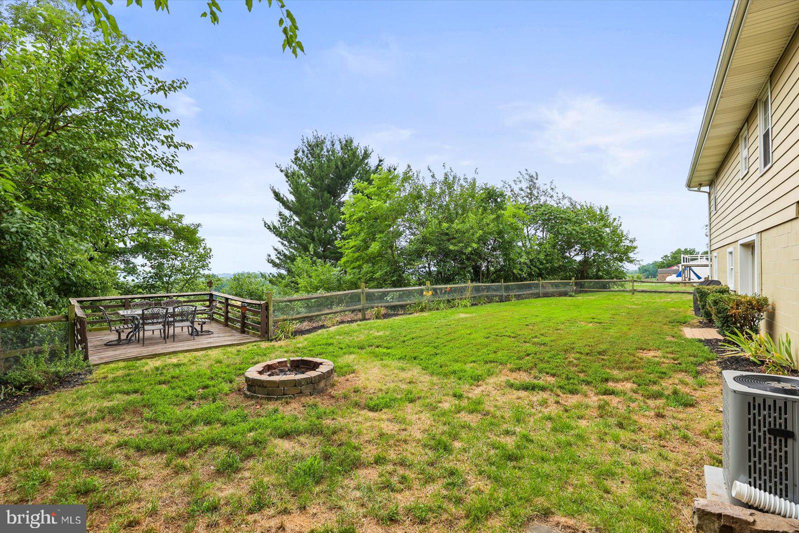 1562 Ridge Road Elizabethtown, PA 17022 - Photo 35 of 41 Serene backyard with lush greenery.