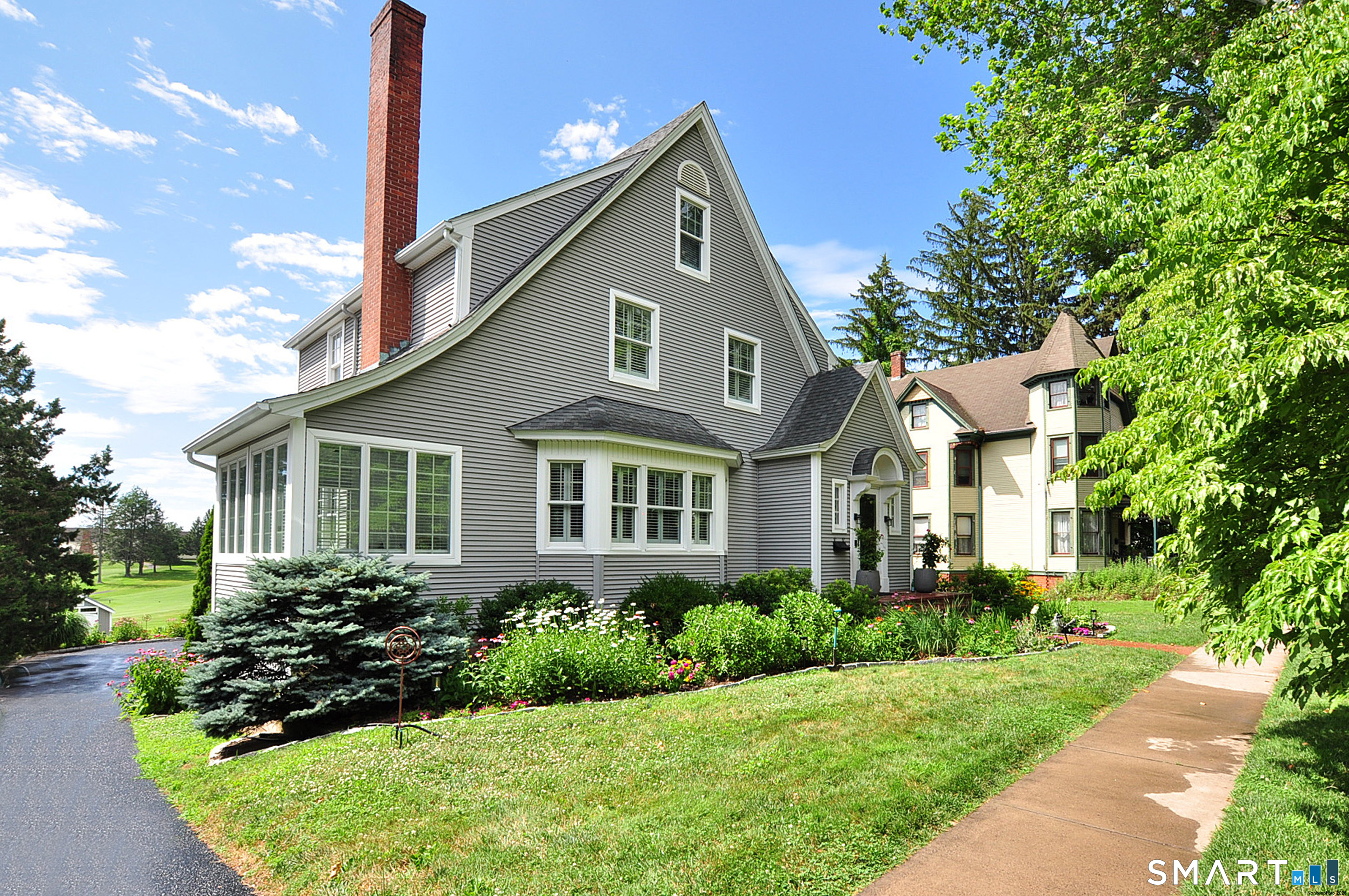 371 North Main Street Suffield, CT 06078 - Photo 39 of 39 a front view of a house with a yard