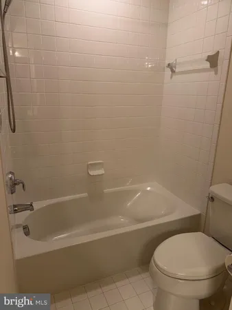 a view of a wooden deck and a yard