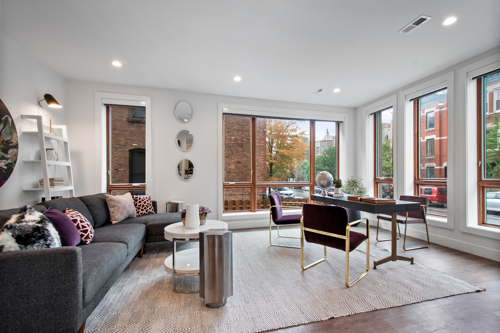1901 North Halsted Street, Unit 1A Chicago, IL 60614 - Photo 15 of 38 a living room with furniture and large windows