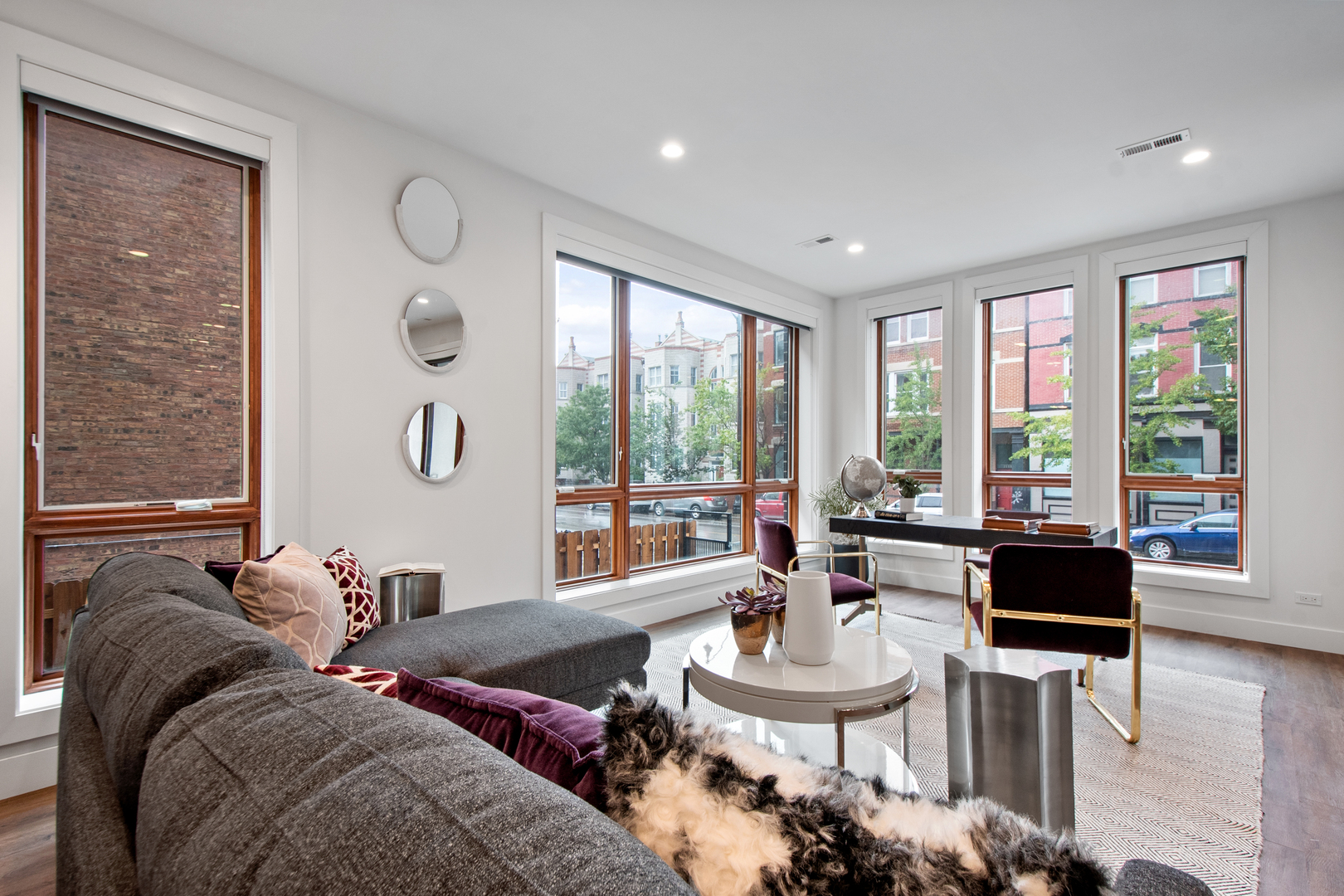1901 North Halsted Street, Unit 1A Chicago, IL 60614 - Photo 18 of 38 a living room with furniture and a large window