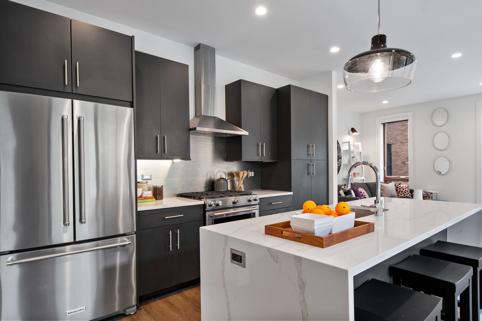 1901 North Halsted Street, Unit 1A Chicago, IL 60614 - Photo 2 of 38 a kitchen with stainless steel appliances a sink a refrigerator and a refrigerator