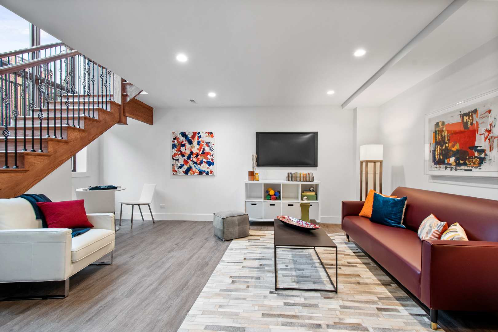 1901 North Halsted Street, Unit 1A Chicago, IL 60614 - Photo 26 of 38 a living room with furniture and a flat screen tv