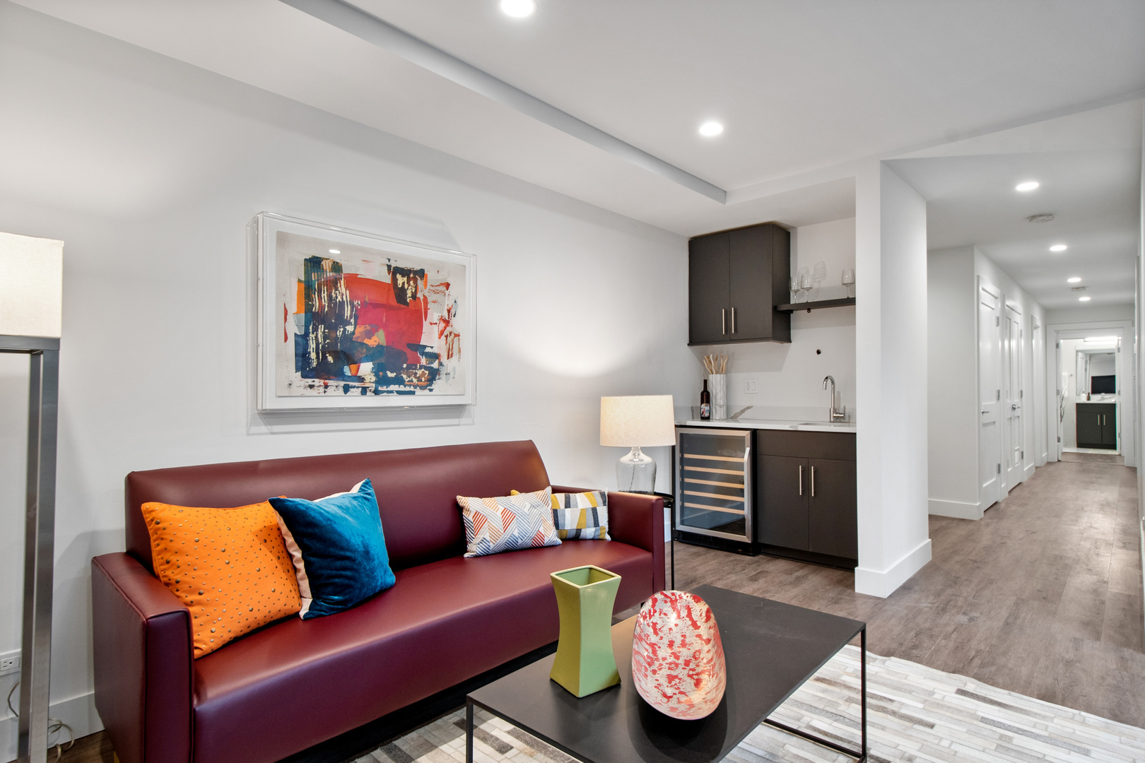 1901 North Halsted Street, Unit 1A Chicago, IL 60614 - Photo 27 of 38 a living room with furniture and a flat screen tv