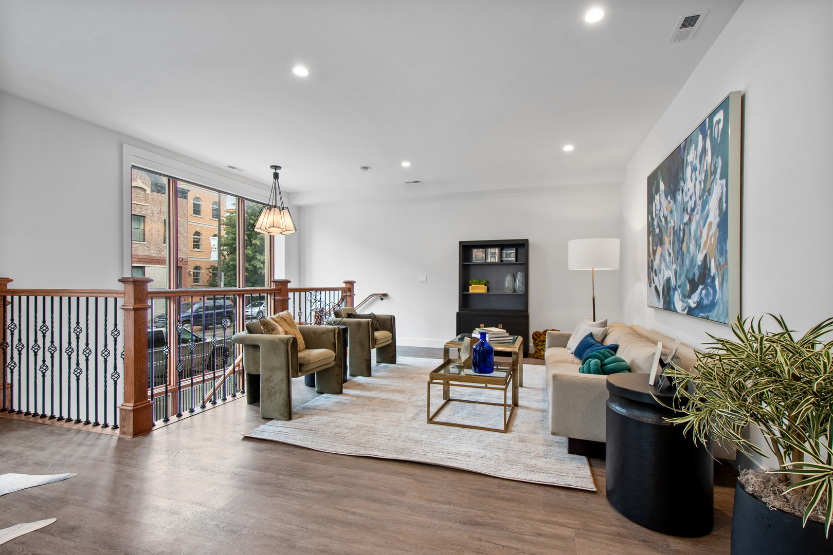 1901 North Halsted Street, Unit 1A Chicago, IL 60614 - Photo 8 of 38 a living room with furniture flat screen tv and wooden floor